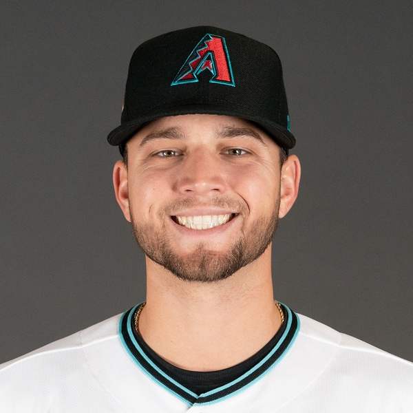 Slade Cecconi smiles for a photo on picture day at Salt River Fields